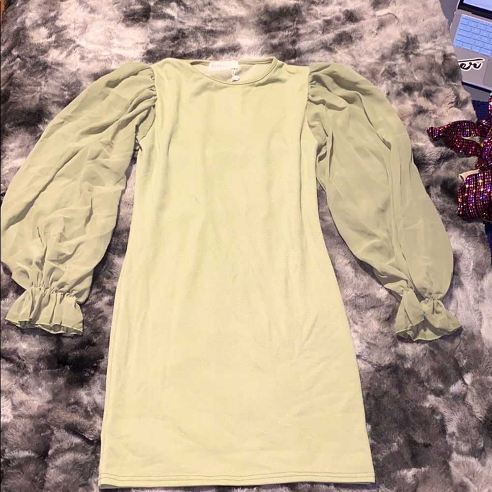 Sage green mini dress w/ puff sleeves.
